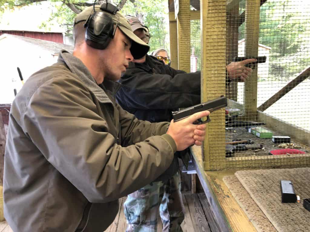 Handgun students on the range learning practical pistol