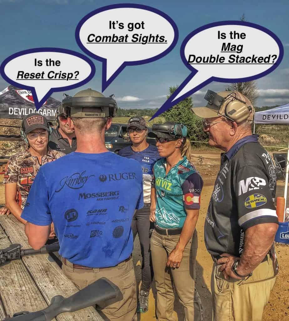 Chris explaining 3 gun competition rules to jerry miculek and team