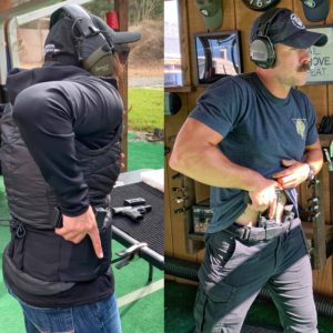 instructor chris & student practicing with holsters